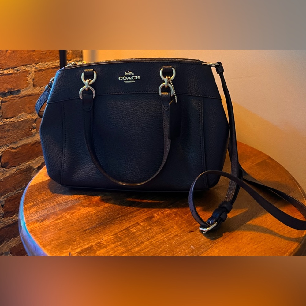 Coach medium sized black handbag.